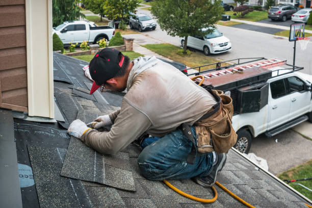 Professional Emergency Roof Repair technician working in Charlotte, VT
